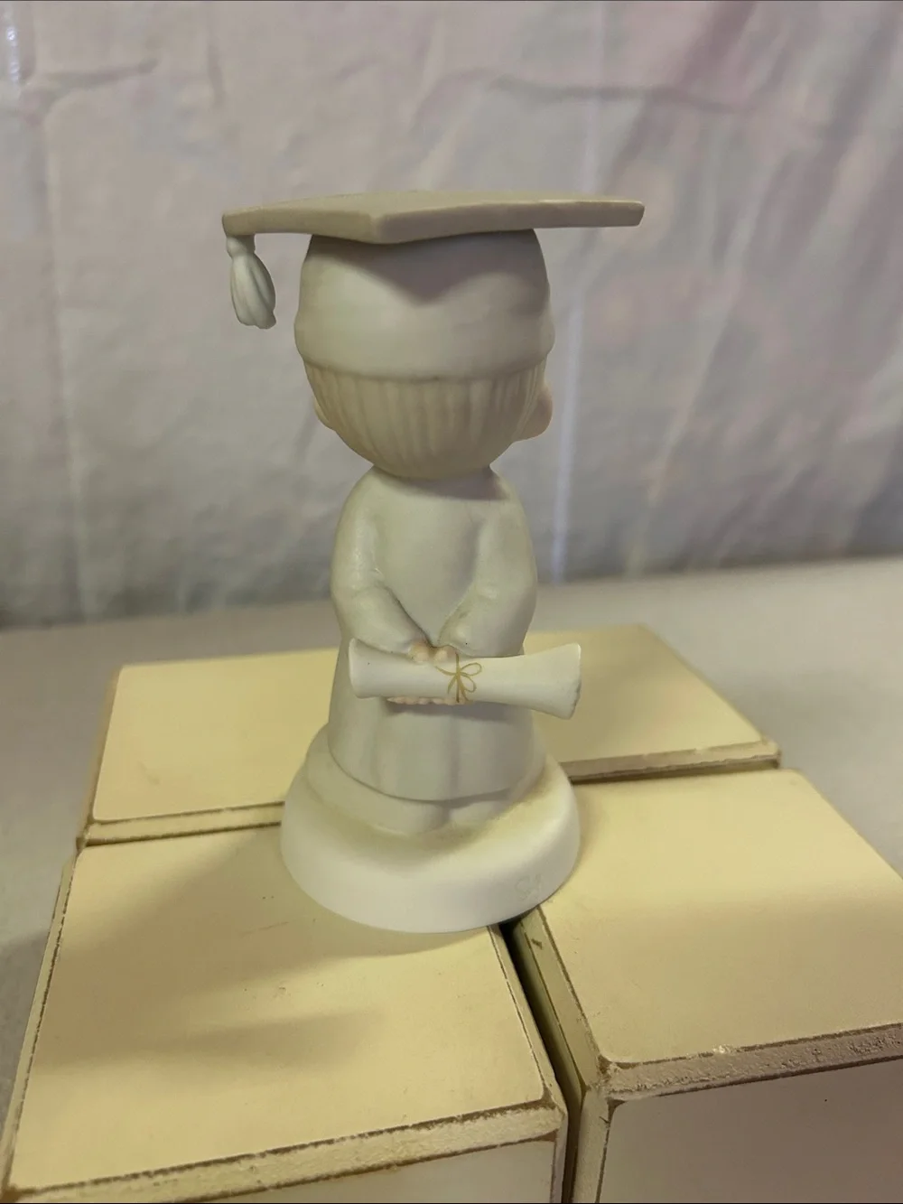 Precious Moments Porcelain Graduate Figurine in White and Pastel Pink